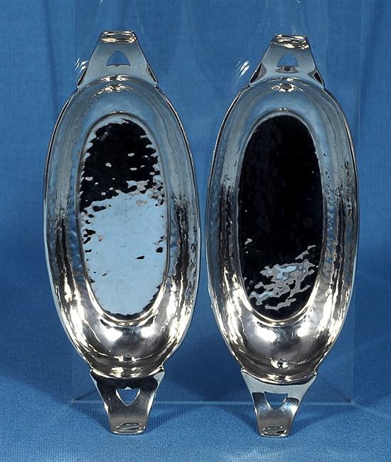 A pair of Edwardian Arts & crafts silver oval navette shaped dishes, by Liberty & Co, Length 139mm, weight 2.8oz/90grms